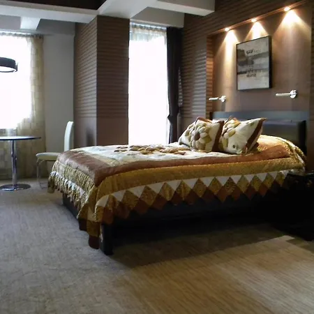 Отель Duvet Center 4*