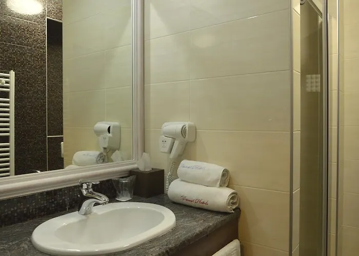 Отель Duvet Center 4*