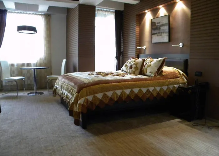 Отель Duvet Center 4*