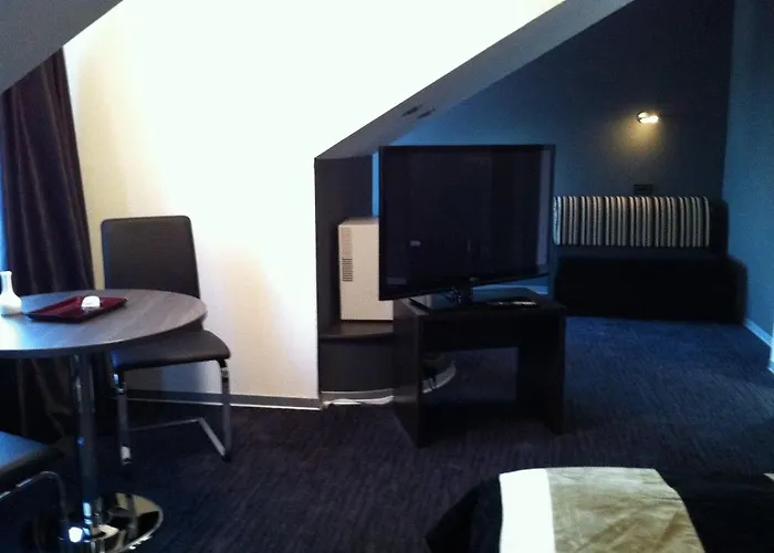 Отель Duvet Center 4*